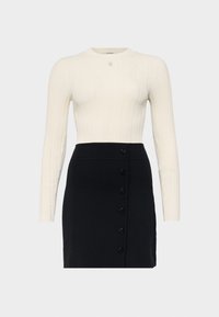Strickkleid - ecru/noir