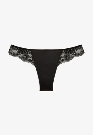 Schwarze String-Lingerie mit transparenten Spitzelementen an den Seiten, glattem Stoff und einem minimalistischen Design.