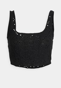 Musta lyhyt toppi neliömäisellä kaula-aukolla, jossa on läpivientikuvioita ja muotoiltuja saumoja. Valmistettu pehmeästä kankaasta, jossa on teksturoitu pinta.