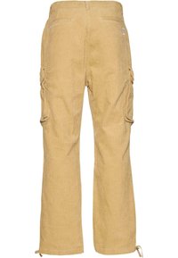 Corduroy cargobyxor i en ljus beige färg, med sidofickor, rak bendesign och synliga randiga mönster. Justerbara ankelsnören.