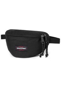 Sort Eastpak bæltetaske lavet af slidstærkt stof, med en rund form, to lynlåse og en justerbar rem. Logo-patch på fronten.