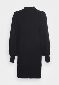 Robe noire en tricot avec un col montant, des manches longues bouffantes et des poignets côtelés. Texture lisse, coupe décontractée et longueur au niveau des genoux.