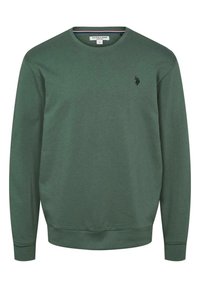 Vihreä puuvillainen collegepaita, jossa on resorikuvio, pyöreä pääntie, pitkät hihat ja kirjailtu logo rinnassa. Yksinkertainen design.