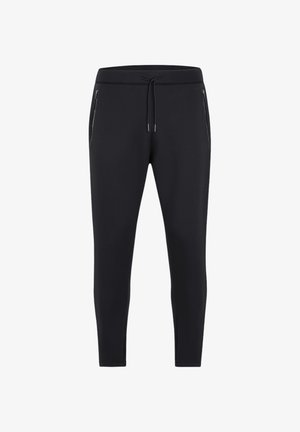 Zwarte jogpants van rekbare stof, met een drawstring tailleband en twee zijzakken met rits voor veilige opslag.