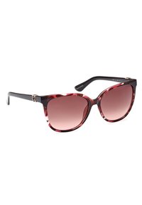 Lunettes de soleil en forme d'œil de chat avec une monture marbrée rouge foncé et rose clair, des verres roses dégradés et un accent logo doré près de la charnière.