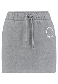 Falda de algodón gris con cinturilla elástica y cordón ajustable, con el diseño impreso "CALVIN KLEIN JEANS NEW YORK" en un diseño circular blanco.