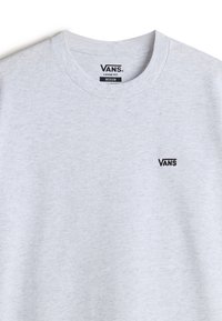 Gray cotton t-shirt with a crew neckline, featuring a small black "VANS" logo on the left side of the chest. Loose fit design.