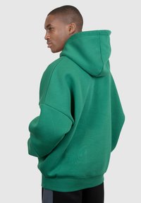 Smilodox LUCIO - UNISEX OVERSIZED - Jersey con capucha - grün