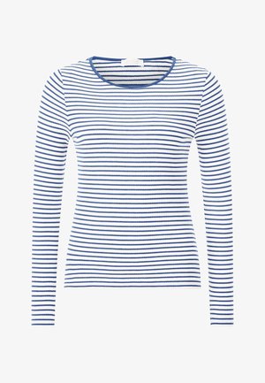 Pikkade varrukatega valget ja tumesinist horisontaalsetest triipudest ülikond, mis on valmistatud ribapinnalise kangaga. Omab ümmargust kaelust ja saleda lõikega disaini.