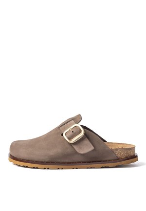 Brown suede slip-on clog with a gold buckle strap, cork footbed, and textured rubber sole, shown on a white background.