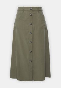 Jupe midi vert olive en mélange de coton, avec un devant à boutons, deux poches latérales et des accents cousus à la taille.