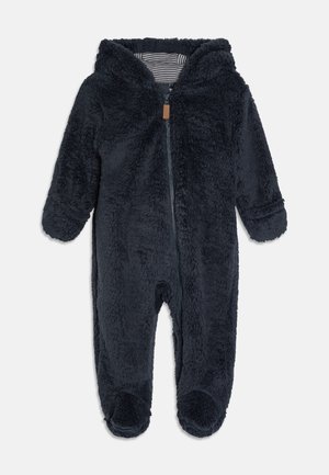 Navyblauwe fleecedons met capuchon, volledige rits en opgerolde manchetten. Zachte textuur met een gevoerde binnenkant die een gestreept patroon heeft.