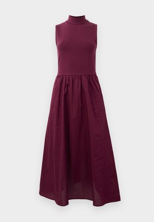 Marlene dress in deep burgundy, featuring a high neck, sleeveless design, fitted bodice, and a flowing, gathered skirt. Smooth fabric texture.
