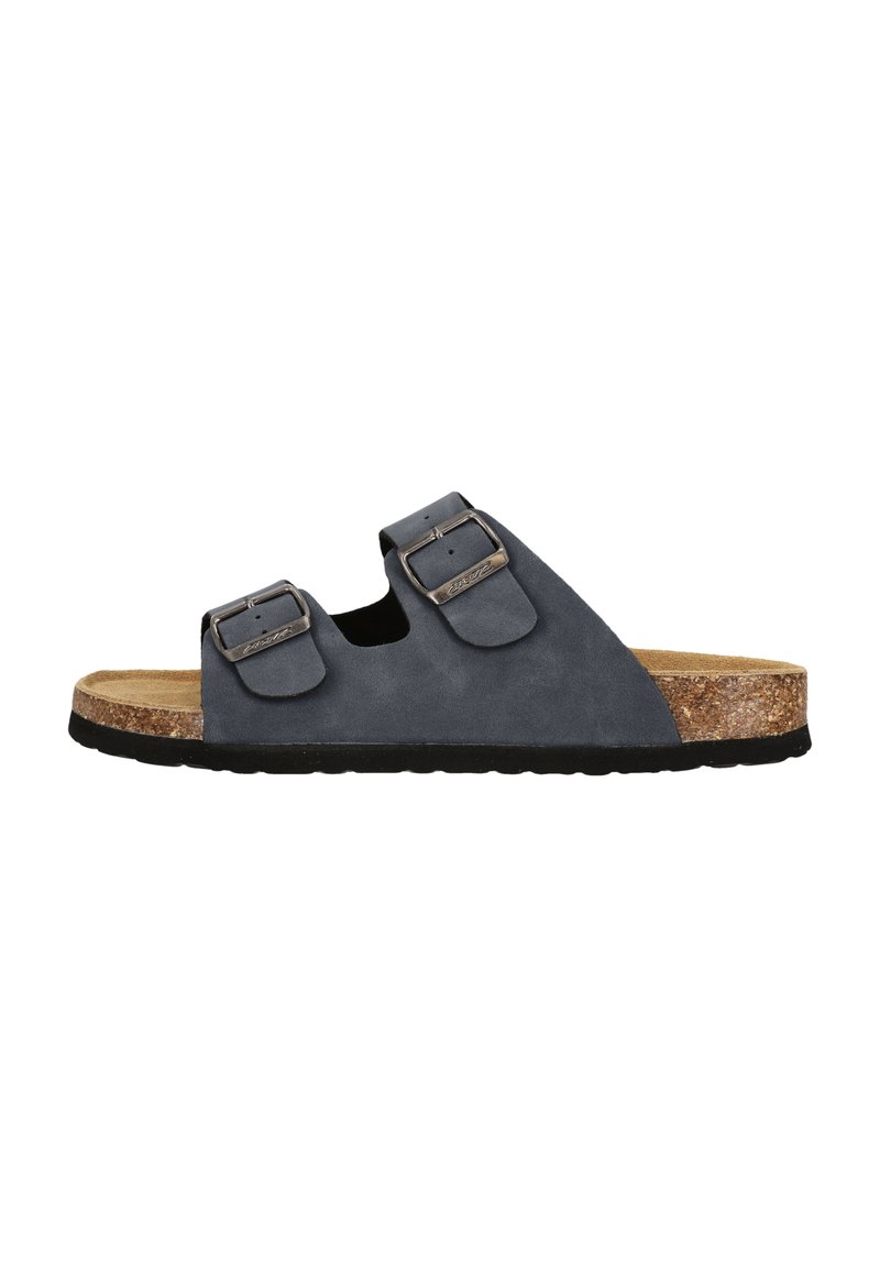 Grå mockaskor med två justerbara remmar, metallspännen, korkfot säng och svart gummisul; öppet tådesign för andningsförmåga.