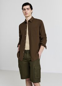 Calliope Shorts - verde militare