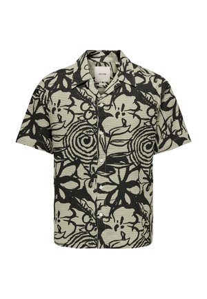 Short-sleeve button-up shirt in light green with black floral pattern, textured fabric, and pointed collar. Features front buttons.