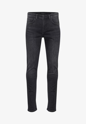 Jeans skinny-fit en denim gris foncé, avec poches latérales et arrière, une fermeture à bouton à l'avant, et des détails de décoloration subtils.