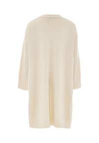 Krämmfärgad, långärmad cardigan med avslappnad passform, rund halsringning, mjuk textur och en mittsöm på baksidan.