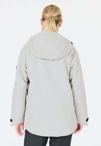 Lichtgrijze jas met capuchon, met een ontspannen pasvorm, elastische manchetten en ritszakken aan de zijkanten. Soepele structuur en een minimalistisch ontwerp.