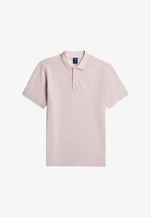 Light pastel pink short-sleeve polo shirt with two buttons, ribbed collar, and subtle embroidered logo on the left chest.