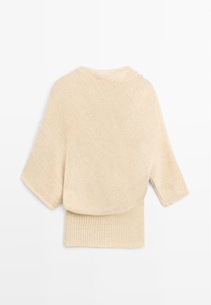 Maglione beige lavorato a maglia con maniche larghe e fascia a coste in vita, mostrato disteso su sfondo bianco.