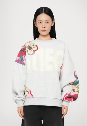 Gray sweatshirt featuring large embroidered floral patterns on one sleeve and bold "STIEG" text in yellow on the front.