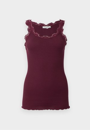 Wine-red ribbed tank top with a scalloped lace trim at the neckline and armholes; fitted shape; soft, textured fabric.