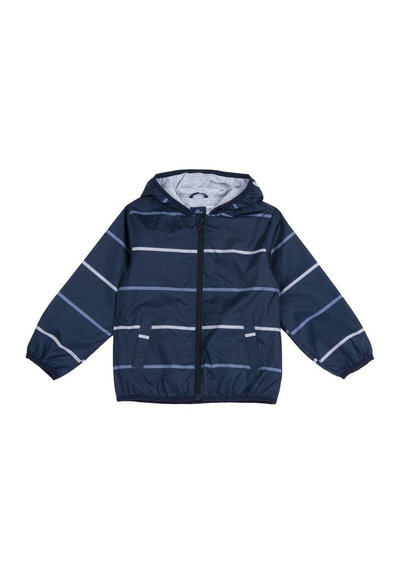 Veste à capuche bleu marine avec des rayures blanches, fermeture éclair à l'avant, poignets et taille élastiques. Matériau léger et résistant à l'eau.