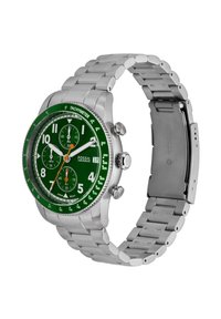 Zegarek chronograf Fossil z zieloną tarczą, srebrną bransoletą ze stali nierdzewnej, świecącymi białymi cyframi, skalą tachometryczną oraz trzema podtarcze.