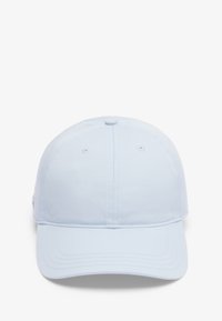 Cappello azzurro chiaro realizzato in un misto cotone. Presenta una visiera curvata, una costruzione a sei pannelli e una cinghia regolabile sul retro.