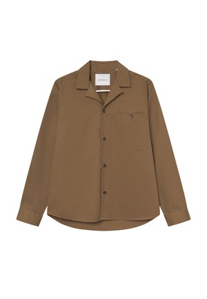 Ruda ilgomis rankovėmis marškiniai su smailiu apykakle, vienu krūtiniu kišeniu ir priekinio užsegimo mygtukais. Lygus audinys su laisvu siluetu.