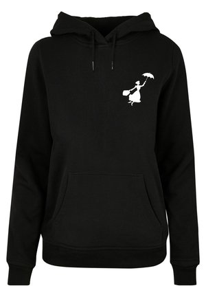 Must see riide, mis on valmistatud pehmest kangast ja millel on känguru tasku. Vasakul rinnal asub valge graafika naisega, kes hoiab vihmavarju.