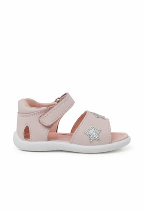 Rosa lædersandal med åbne sider, velcro-strop og glitrende sølvstjerne accenter foran. Hvid tekstureret sål.