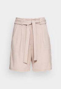 Vaaleanbeiget korkeavyötäröiset shortsit, joissa on edessä solmittu kangashihna, laskokset vyötärön alapuolella ja sivutaskut.