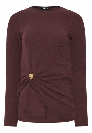 Bordeauxrode lange mouwen gebreide top met ronde hals en gedraaide gesp in goudkleurige tint bij de taille.