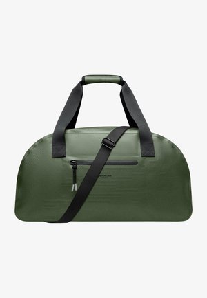 Sac de sport vert en matériau texturé, doté de deux poignées noires et d'une sangle ajustable, avec une poche avant zippée.