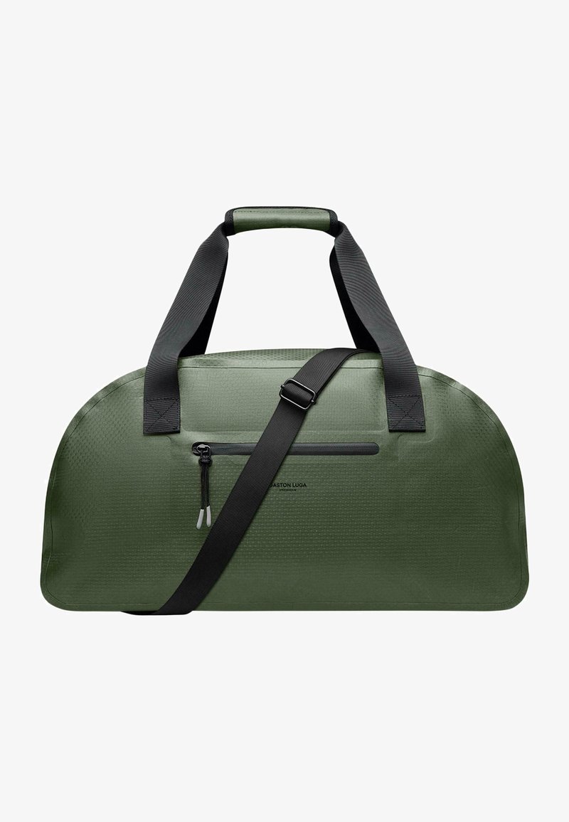 Borsa a viaggio verde realizzata in materiale texturizzato, con manici neri doppi e una tracolla regolabile, dotata di una tasca frontale con zip.