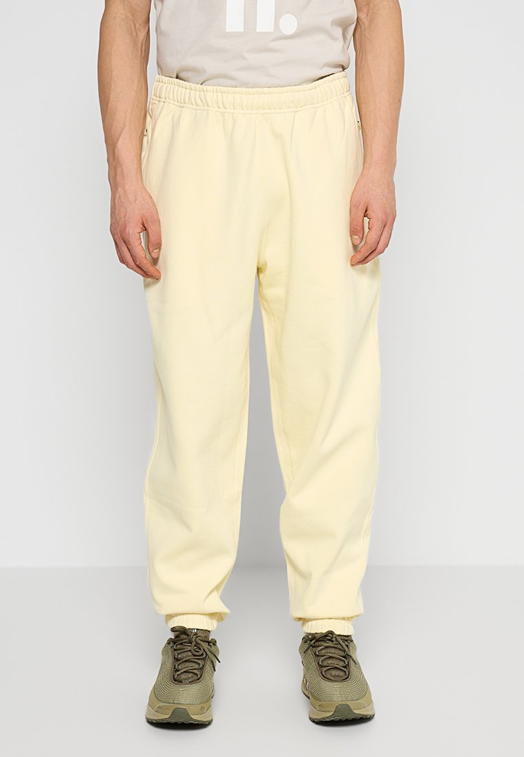 Nike Sportswear Trainingsbroek lichtgeel Nike Sportswear Trainingsbroek lichtgeel