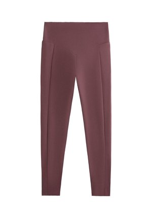 Leggings ajustés taille haute de couleur prune douce avec un détail de couture en V à la taille avant.