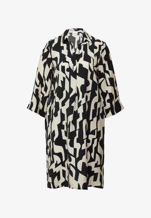 Šaty na košili s černobílým vzorem, límečkem, tříčtvrtečními rukávy a volným střihem. Texturovaná tkanina s abstraktními tvary.