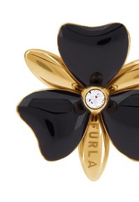 Černá květinová brož s lesklými okvětními lístky, zlatými kovovými akcenty a centrálním průhledným krystalem. Vyryto "Furla" na pásku.