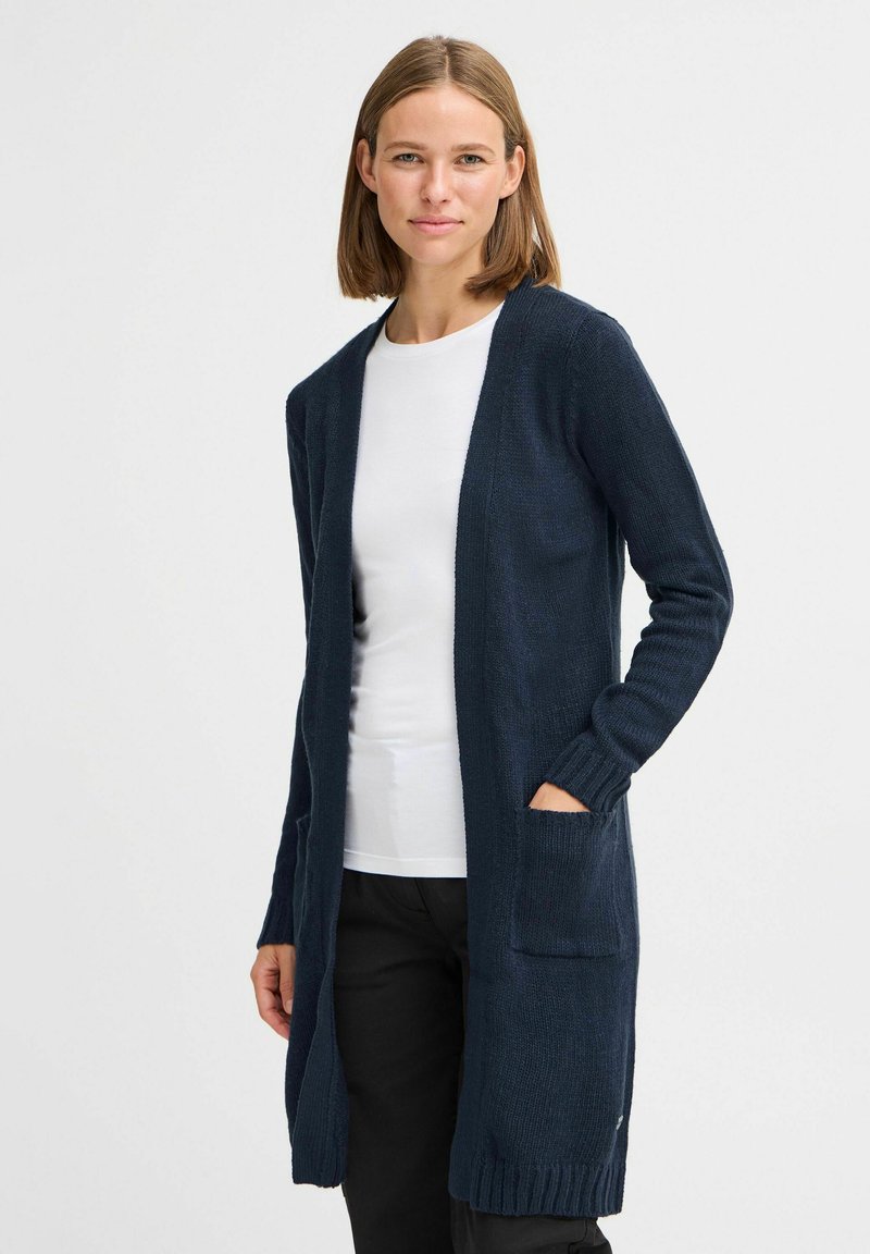Marinblå stickad cardigan med öppen framsida, långa ärmar, ribbade muddars och framfickor, tillverkad av strukturerad tyg.