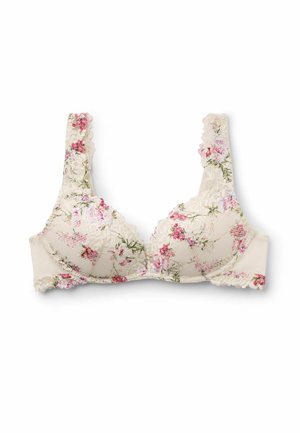 Soutien-gorge en dentelle crème avec motif floral rose et vert, bords festonnés et larges bretelles.