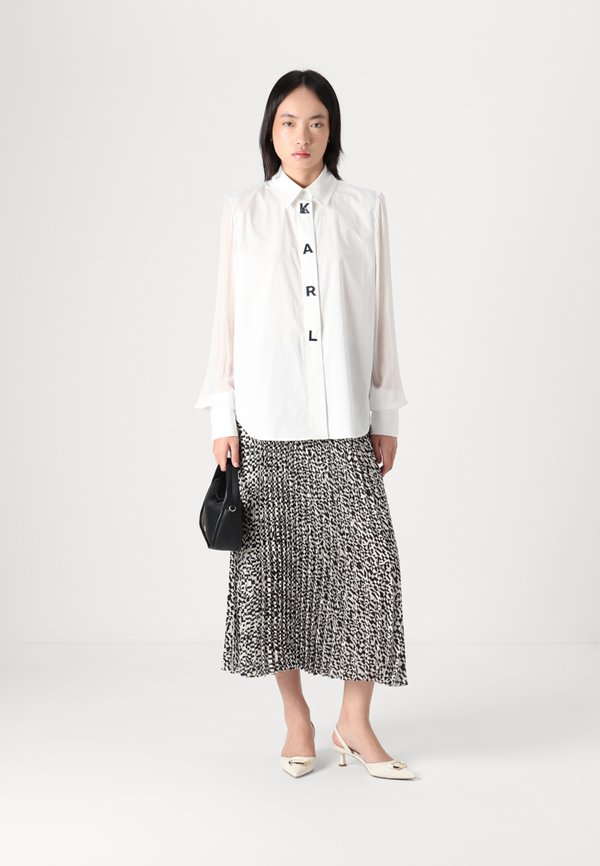 COMMERCIAL  - Pleated skirt2