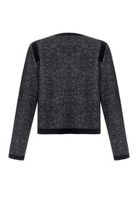 Svart och grå stickad kofta med långa ärmar, kort design och texturerat tyg. Har solid svarta detaljer på axlarna och ärmsluten.