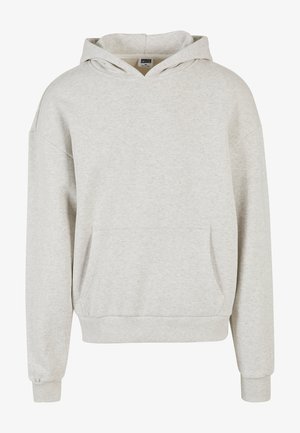 Világosszürke kapucnis pulóver, puha anyagból készült. Elülső zsebbe, állítható kapucniba, valamint bordázott mandzsettákkal és aljúval rendelkezik a kényelmes viselet érdekében.