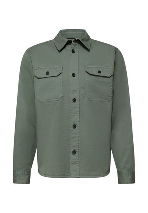 Camicia verde oliva a maniche lunghe con bottoni neri al centro e sulle tasche anteriori con patta.