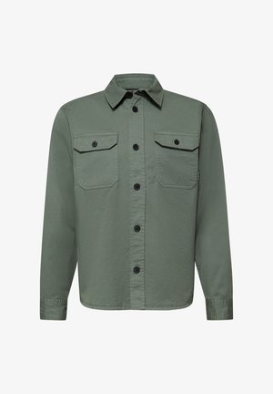 Camicia verde oliva a maniche lunghe con bottoni neri al centro e sulle tasche anteriori con patta.