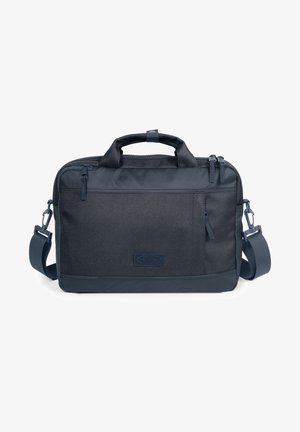 Mørkeblå messenger taske med tekstureret stof, dobbelt lynlås, frontlomme og justerbar rem. Rent design med polstret håndtag.