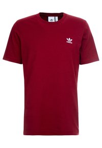 Camiseta de algodón color marrón con mangas cortas, cuello redondo y un logo trefoil blanco de Adidas en el lado izquierdo del pecho. Textura suave con un ajuste casual.